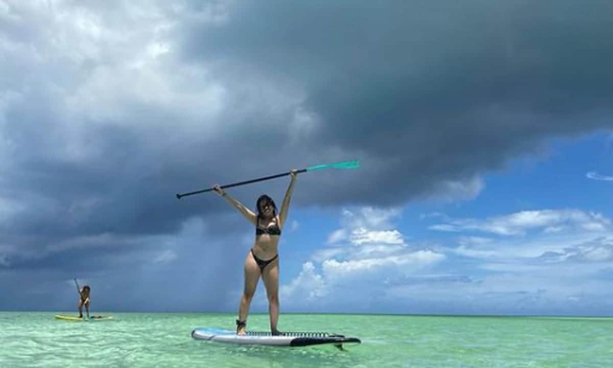 Camila Cabello paddleboards