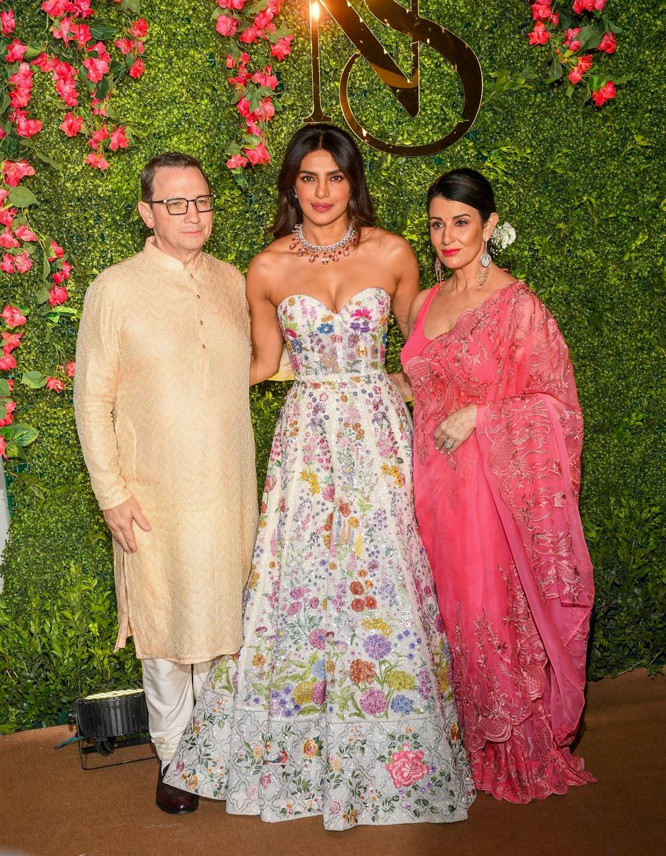 
Priyanka Chopra attended a glamorous cocktail party in Mumbai to celebrate her brother, Siddharth Chopra. She was joined by her father-in-law, Kevin Jonas Sr., and mother-in-law, Denise Miller-Jonas, making it a family affair. The trio was seen enjoying the evening, adding to the star-studded ambiance of the celebration. 