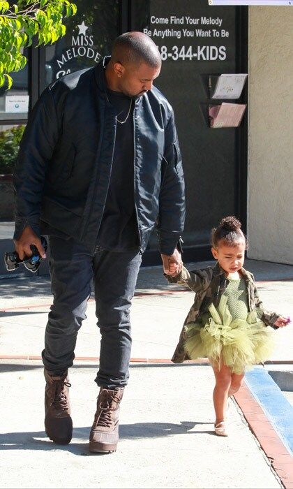 <b>November 2015</b>
<br>
Rocking camo style - North is more casual in an army green long-sleeve and matching tutu.
</br><br>
Photo: Getty Images
