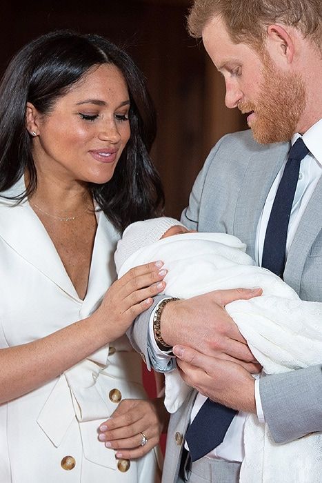 Meghan Markle and Prince Harry with baby Sussex