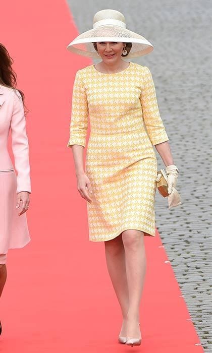 Nude accessories complement Queen Mathilde of Belgium's pretty print.
<br>
Photo: Getty Images
