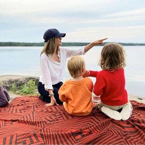 Prince Gabriel was photographed sweetly holding his big brother’s hand during a summer picnic