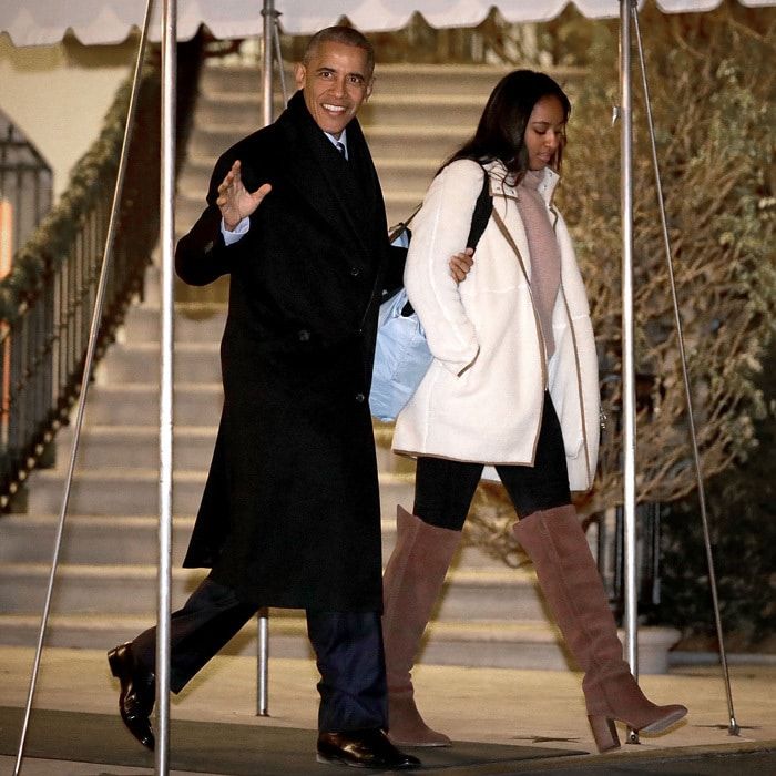 December 2016: Sasha kept warm in thigh-high brown boots and a white fleece coat as she and her father left the White House for a trip to Hawaii.
Photo: Chip Somodevilla/Getty Images