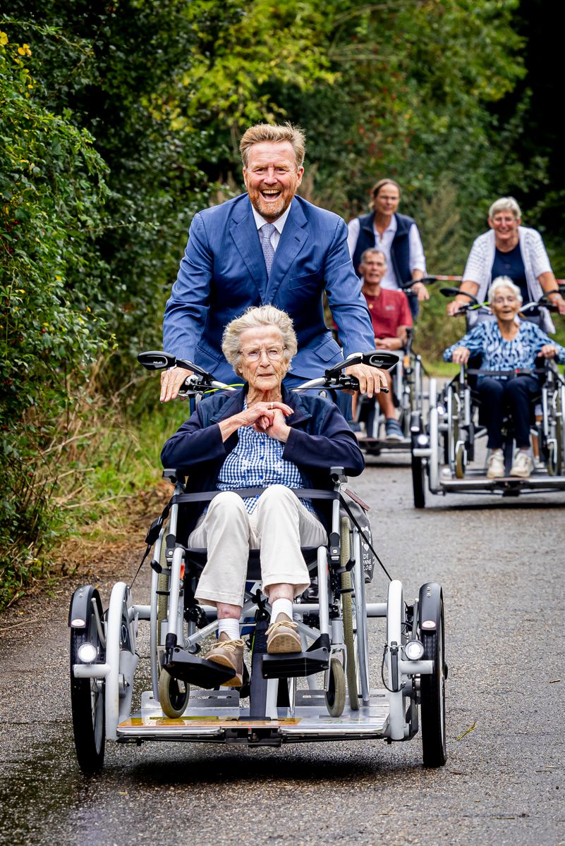 MIRNS, NETHERLANDS - SEPTEMBER 4: King Willem-Alexander of The Netherlands meets with a resident as he attends the 75th anniversary of De Zonnebloem on September 4, 2024 in Mirns, Netherlands. De Zonnebloem is committed to people with a physical disability. (Photo by Patrick van Katwijk/Getty Images)