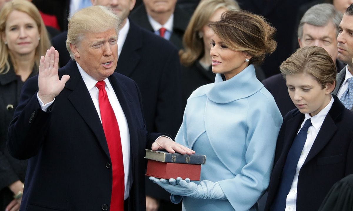 A NEW LEADER
January 20 was a historic day in U.S. politics. Donald Trump was sworn in as the 45th President, his wife Melania dutifully holding the bible while he took the oath. The President and First Lady were supported by their son Barron, Donald's four older children and his grandchildren.
Photo: Getty Images