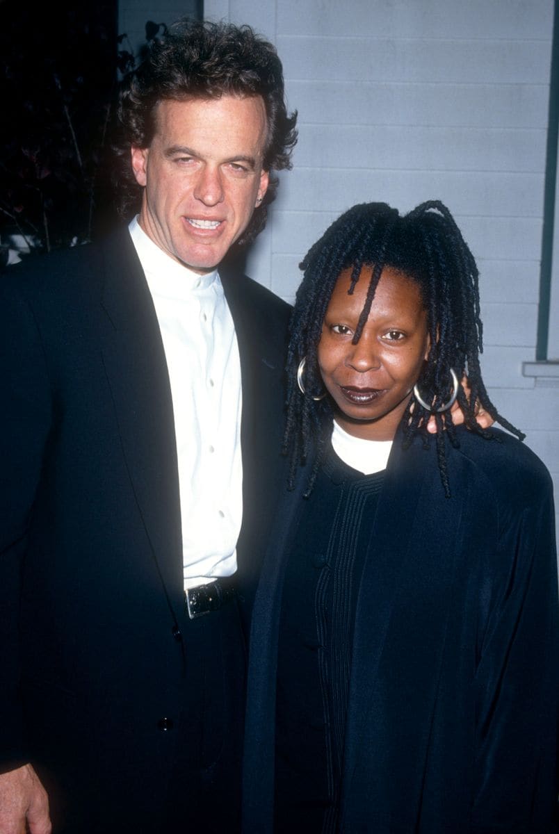 Lyle Trachtenberg and Whoopi Goldberg pose for a portrait as they arrive for the Dream Street Foundation Award dinner on October 22, 1994