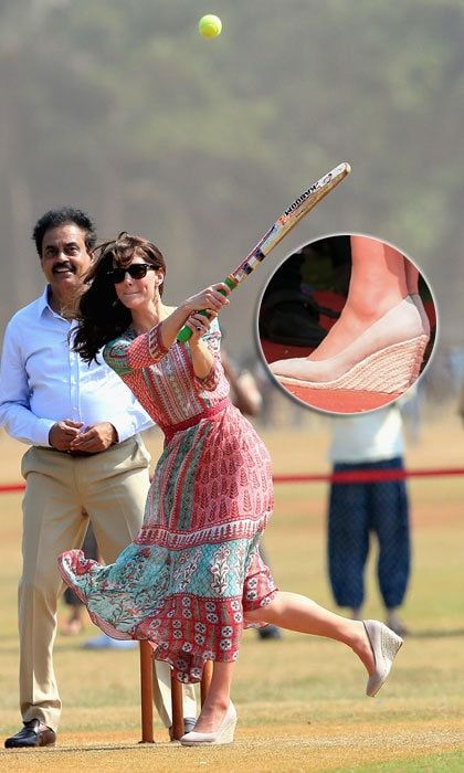 Kate Middleton opted for her favorite pair of wedges during her royal visit in India when she took part in a cricket match in Mumbai.
<br>
Photo: Getty Images