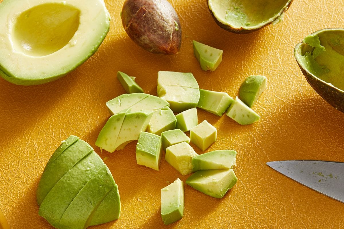 A ripe avocado should have a light green color and be soft to the touch