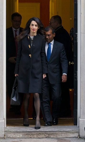Sporting a sleek coat, Amal left a meeting with former British Prime Minister, David Cameron.
<br>
Photo: Getty Images
