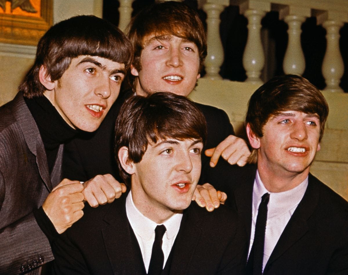 George Harrison, John Lennon , Paul McCartney, and Ringo Starr. 