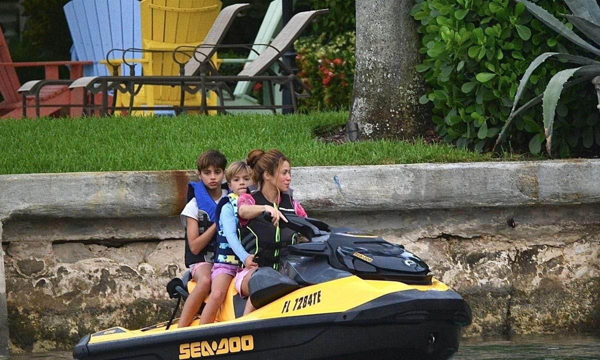 Shakira and her kids on the jet ski