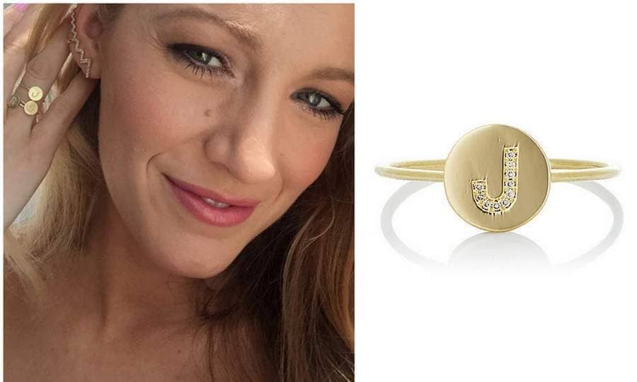 Stars love Jennifer Meyer's delicate baubles, especially her nameplates, diamond initial charms and name rings. In April 2016, Blake Lively (seen) showed off her trio of initial rings, including a 'J' for daughter James and an 'R' for husband Ryan Reynolds.
Celebrity fans: Reese Witherspoon, Jennifer Aniston
Jennifer Meyer Mini Initial Disc Ring, $1,275, barneys.com