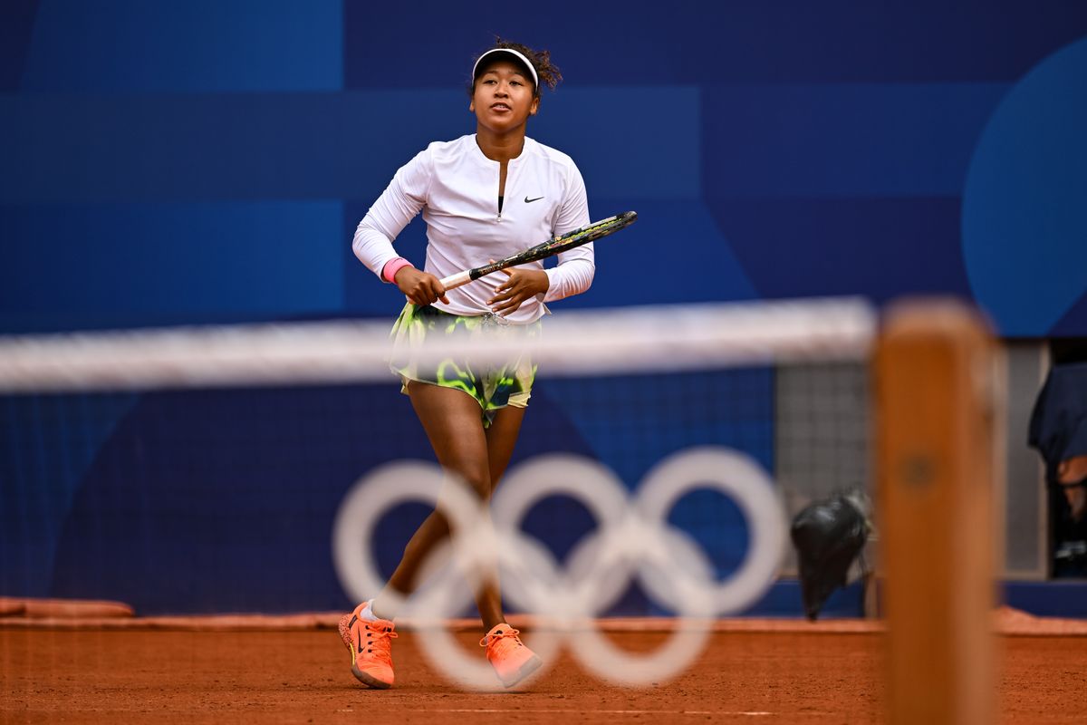 Naomi Osaka of Japan reacts during a Tennis training session ahead of the Paris 2024 Olympic Games at Roland Garros on July 25, 2024 in Paris, France. 