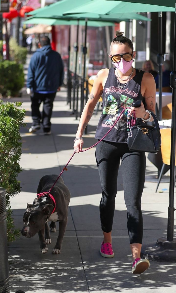 Miley Cyrus and dog