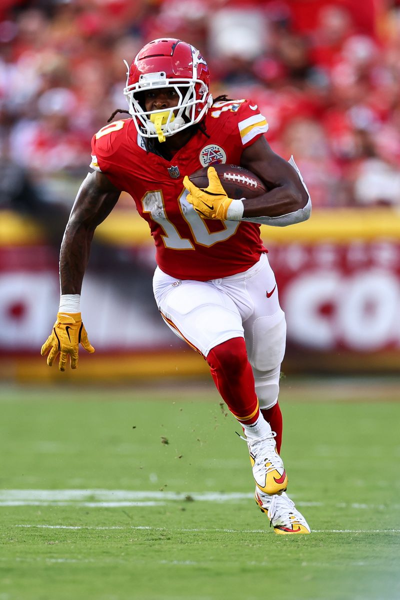  Isiah Pacheco, #10 of the Kansas City Chiefs, carries the ball during the second quarter of an NFL football game against the Cincinnati Bengals at GEHA Field at Arrowhead Stadium on September 15, 2024, in Kansas City, Missouri. (Photo by Kevin Sabitus/Getty Images)