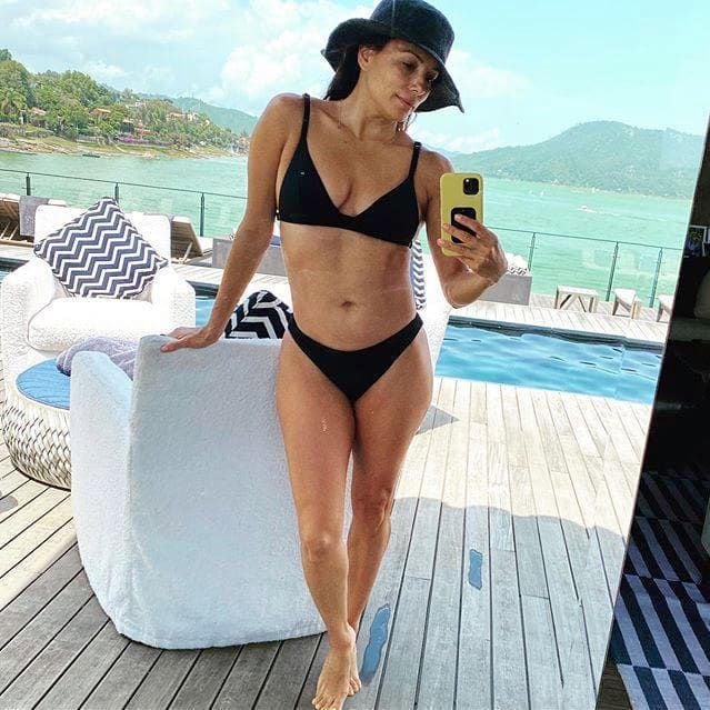Eva Longoria showed off her bikini body in a black swimsuit, which was inspired by her