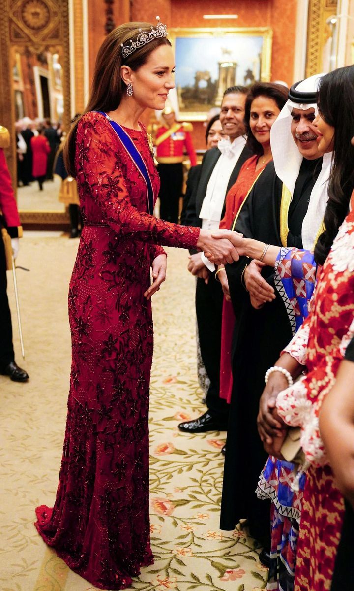 The Princess spoke with guests during the reception at Buckingham Palace. According to the royal family's website, "over 500 members of the Diplomatic Corps" are welcomed "in the State Rooms at Buckingham Palace" at the reception.