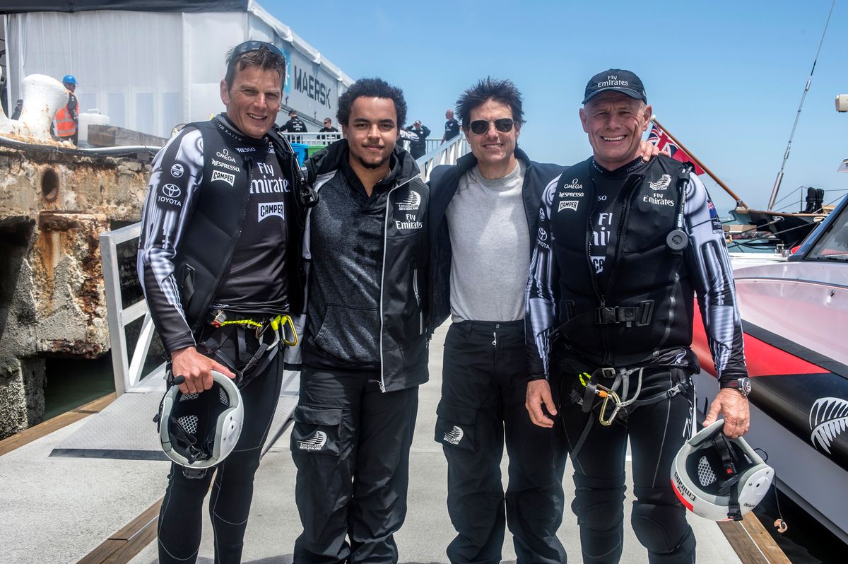 In this handout provided by Emirates, (L-R) Emirates Team New Zealand Skipper Dean Barker, Connor Cruise, Tom Cruise and Emirates Team New Zealand Managing Director Grant Dalton pose for a photo after Tom Cruise went for a ride on NZL5 after the Louis Vuitton Cup Round Robin 5 race against Team Luna Rossa Challenge on July 28, 2013 in San Francisco, California. (Photo by Chris Cameron/Emirates via Getty Images)