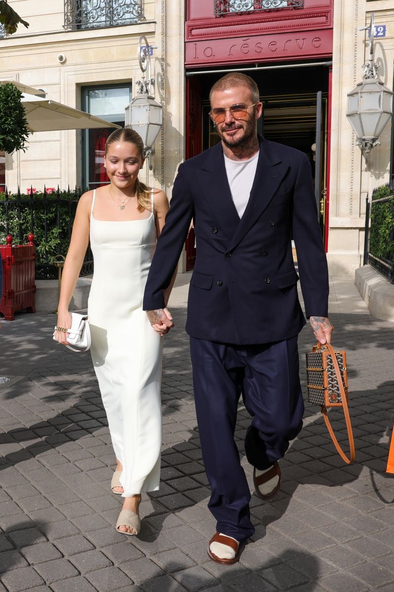 Harper Beckham and David Beckham  are seen leaving their Hotel during the Womenswear Spring/Summer 2024 as part of Paris Fashion Week 