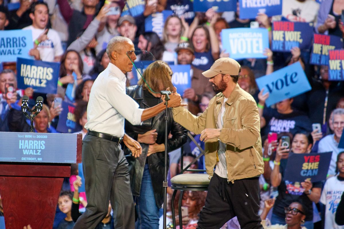 Rapper Eminem introduces former president Barack Obama during a rally to supporters of Vice President Kamala Harris 2024 presidential run in Detroit, MI, Tuesday, Oct. 22, 2024. (Photo by Dominic Gwinn / Middle East Images / Middle East Images via AFP) (Photo by DOMINIC GWINN/Middle East Images/AFP via Getty Images)