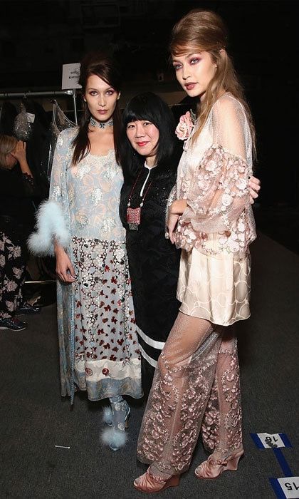 Sisters Bella and Gigi Hadid looked fierce in their runway looks as they posed with designer Anna Sui backstage at her show.
Photo: Astrid Stawiarz/Getty Images for New York Fashion Week: The Shows