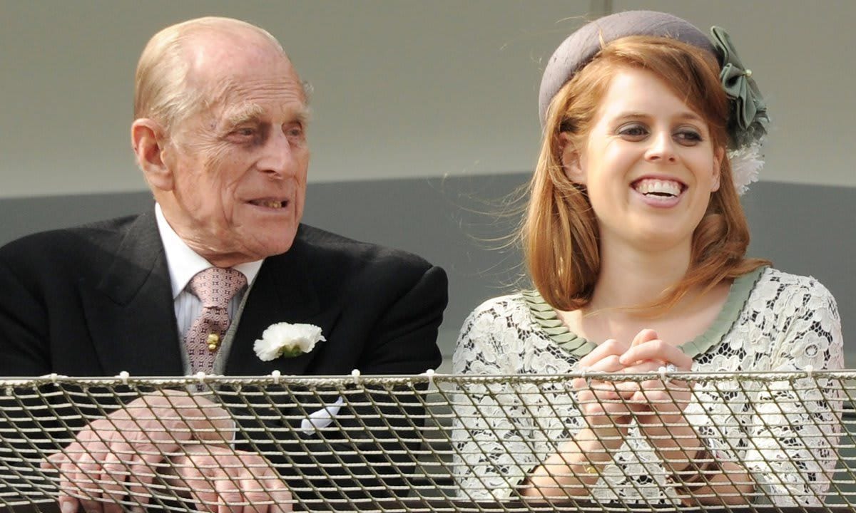 Princess Beatrice appeared to be enjoying her grandfather's company at the 2012 Investec Derby Festival.