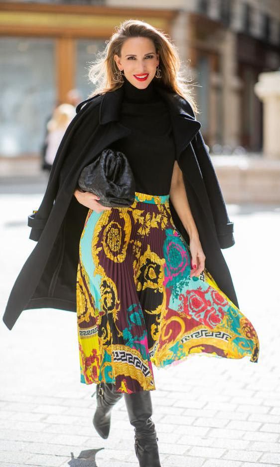 Alexandra Lapp wearing a colorful midi skirt