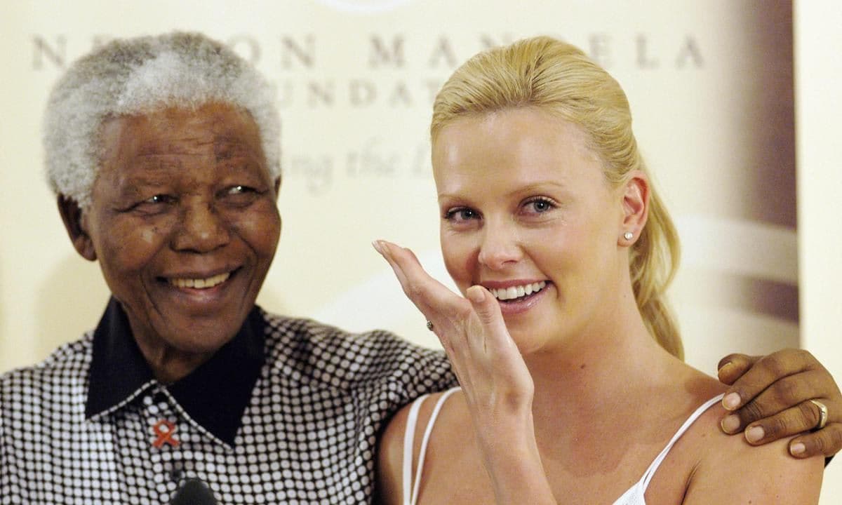 Nelson Mandela Photocall With Charlize Theron