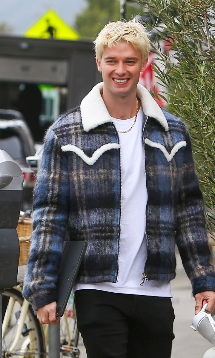 Patrick Schwarzenegger is seen smiling showcasing his new look as a blonde.