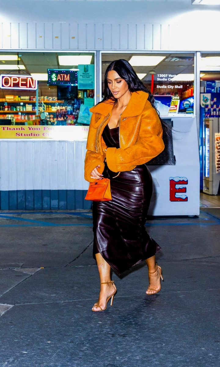 Kim Kardashian stops at the gas station while wearing her ex husband Kanye West's YEEZY line