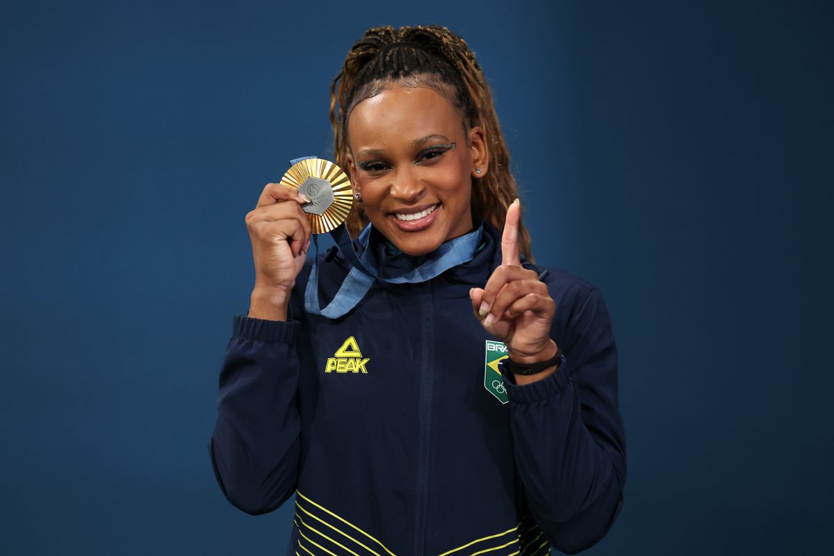 Gold medalist Rebeca Andrade of Team Brazil poses after the Artistic Gymnastics Women's Floor Exercise Medal Ceremony on day ten of the Olympic Games Paris 2024 at Bercy Arena on August 05, 2024 in Paris, France. (Photo by Jamie Squire/Getty Images)