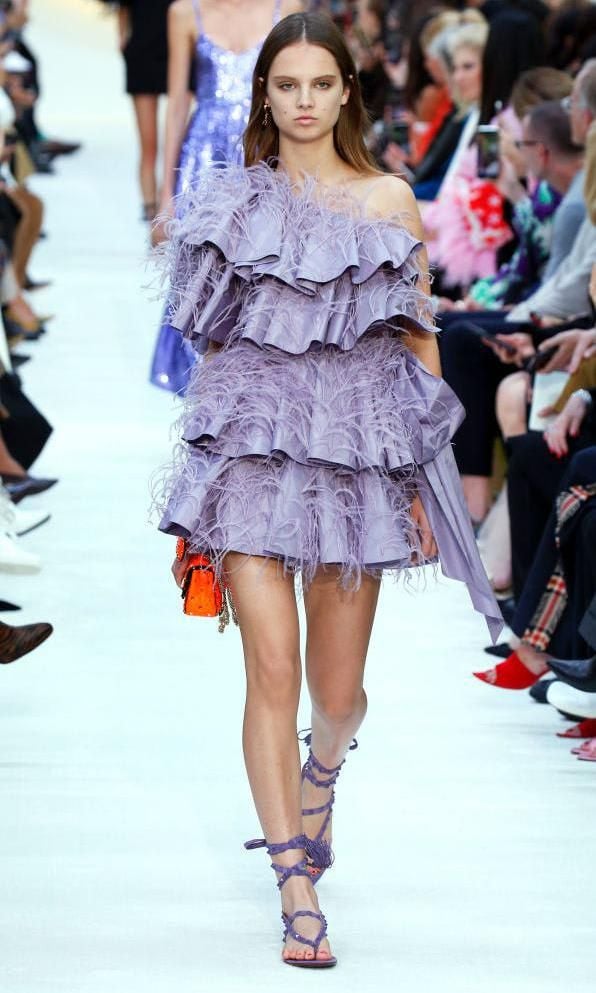 Short dress featuring feathery trims and ruffles by Valentino