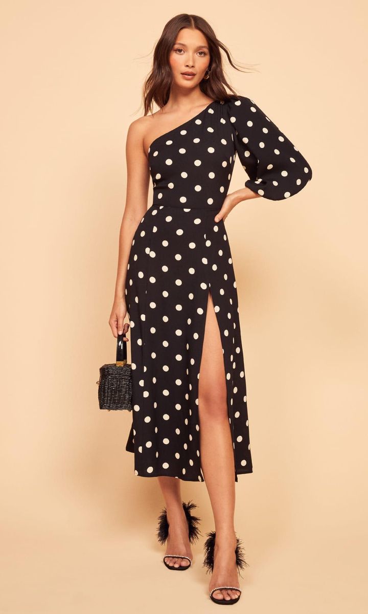 Asymmetrical dress with puff sleeves and polka dots by Reformation