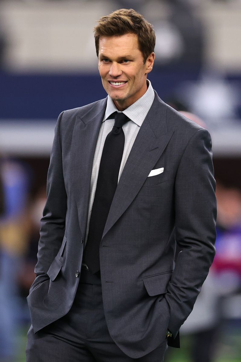 ARLINGTON, TEXAS - NOVEMBER 28: Tom Brady looks on prior to the game between the Dallas Cowboys and the New York Giants at AT&T Stadium on November 28, 2024 in Arlington, Texas. (Photo by Sam Hodde/Getty Images)