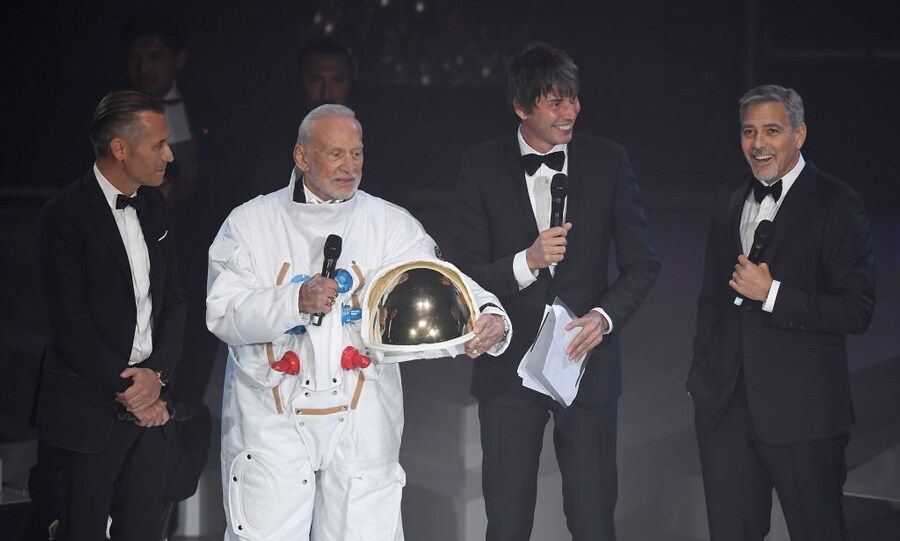 April 26: George Clooney took the stage with Buzz Aldrin, Omega President and CEO Raynald Aeschlimann and Professor Brian Cox at the OMEGA 'Lost In Space' dinner to celebrate the 60th anniversary of the OMEGA Speedmaster in London.
Photo: Getty Images
