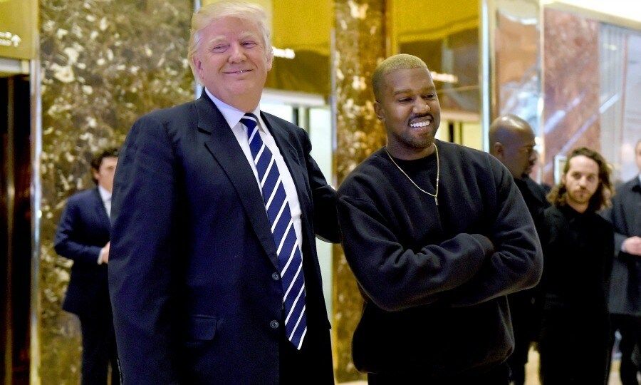 December 13: Mr. West meets Mr. Trump! Kanye West (and his blonde hair) met with President-elect Donald Trump inside of Trump Towers in NYC.
Kim Kardashian's husband took to his Twitter to share that the two discussed multicultural issues and showed off his signed Time magazine.
Photo: TIMOTHY A. CLARY/AFP/Getty Images