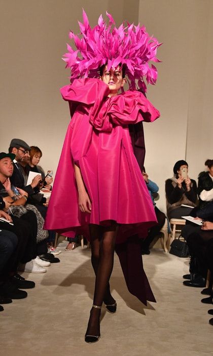 Kaia Gerber wore a hot pink dress and head piece in the Valentino Haute Couture show. A day prior, the 16-year-old also showed off her runway strut in a blush dress from Chanel.
Photo: Getty Images