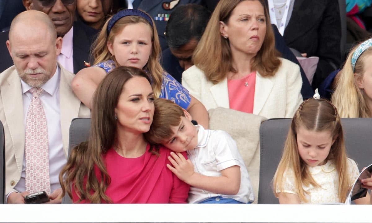 The Prince took a break to rest on his mother's shoulder.