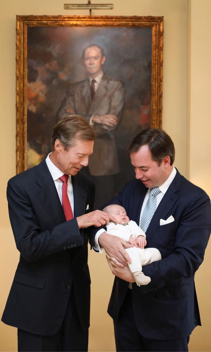 Grand Duke Henri poses with his son Hereditary Grand Duke Guillaume and his fifth grandchild Prince Charles