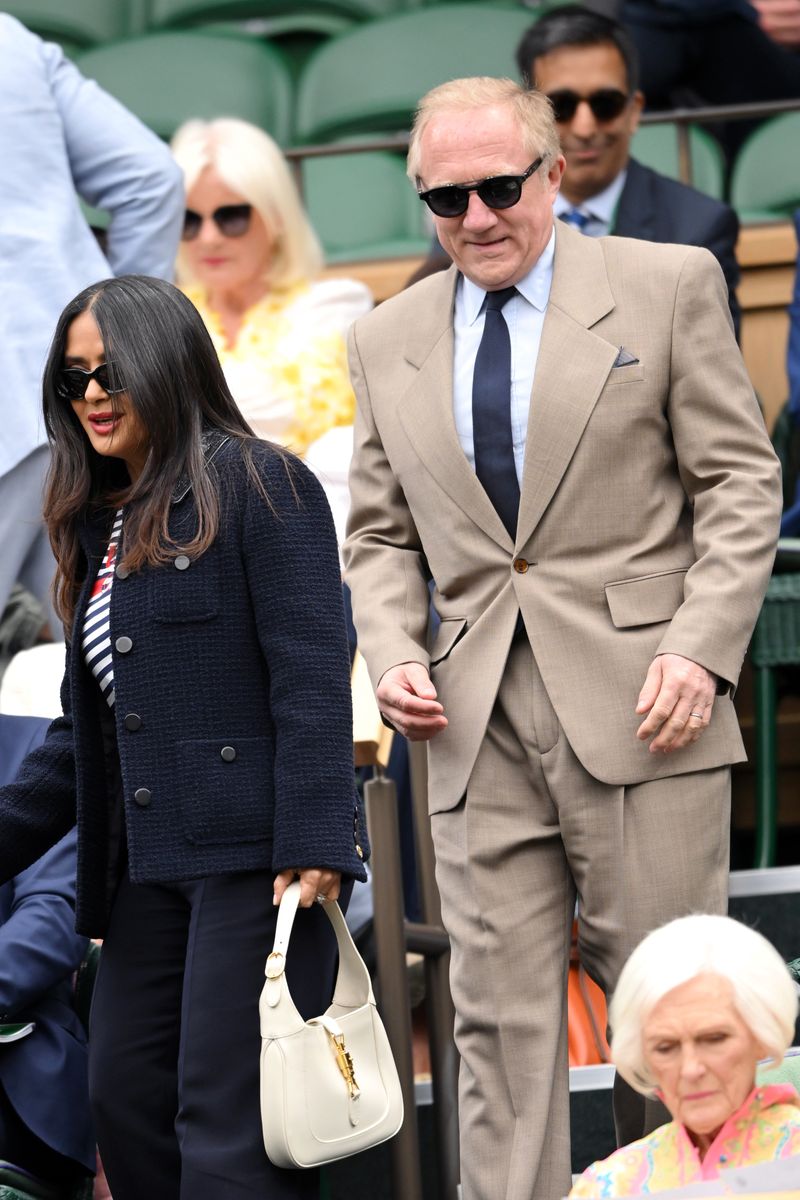 Salma Hayek and Francois-Henri Pinault attend day seven of the Wimbledon Tennis Championships at the All England Lawn Tennis and Croquet Club on July 07, 2024, in London, England. 