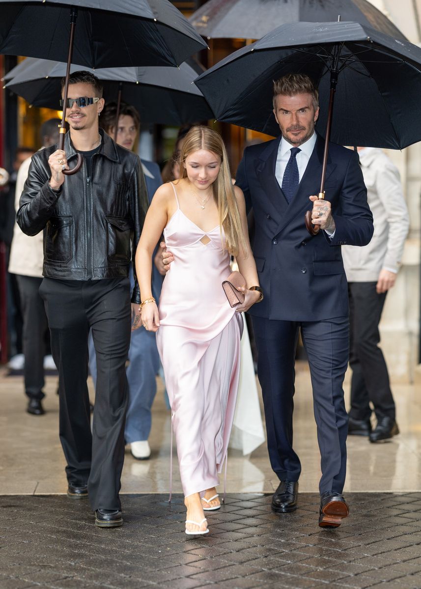 Romeo, Harper, and David Beckham on their way to the fashion show in Paris