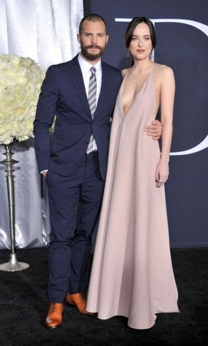 February 2: Dakota Johnson took the plunge in a Valentino crepe couture dress with Cartier jewelry alongside Jamie Dornan, who was sporting a new buzz cut, during the premiere of <i>Fifty Shades Darker</i> in L.A.
Photo: Gregg DeGuire/WireImage