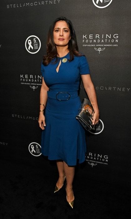 November 21: Salma Hayek-Pinault was the definition of fall style in a blue dress during the screening of <i>Sonita</i> in London.
Photo: David M. Benett/Dave Benett/Getty Images for Kering