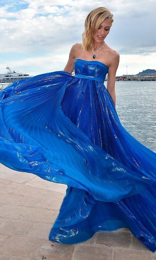 Model Anja Rubik in a satin pleated dress by Dsquared2 on her way to the amfAR gala held during the 60th edition of the Cannes Film Festival.
<br>
Photo: Getty Images