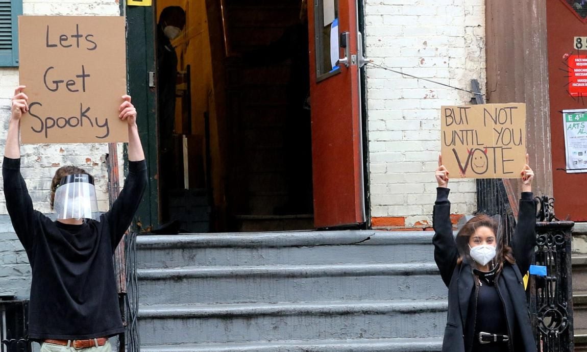 Vanessa Hudgens pictured keeping social distance and protective mask on with "Dude with sign"