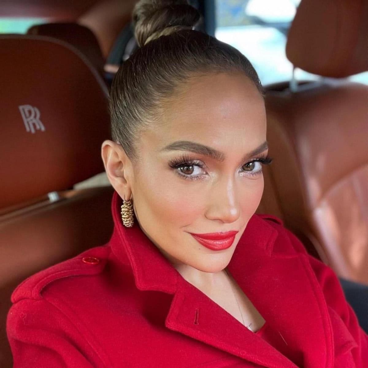 Jennifer Lopez, in her monochromatic holiday look