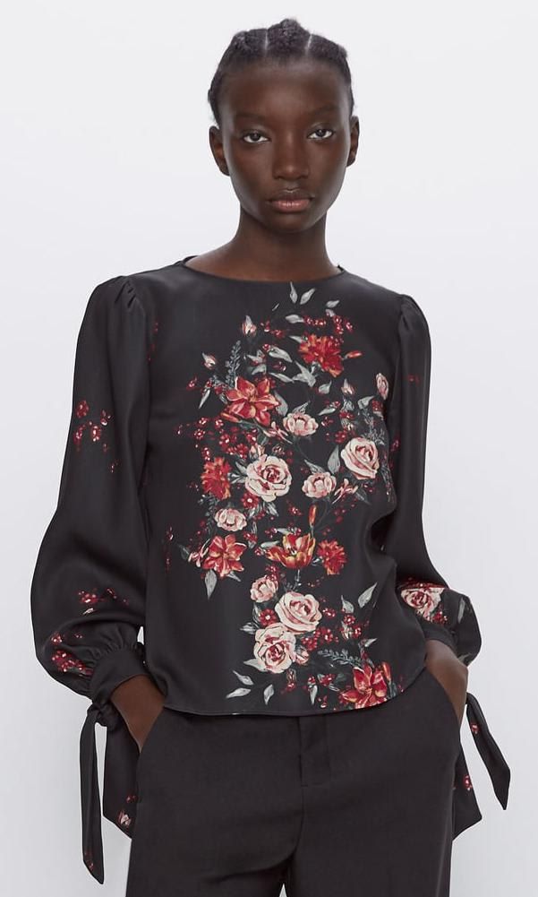 Black blouse with a bouquet of red and pink flowers by Zara