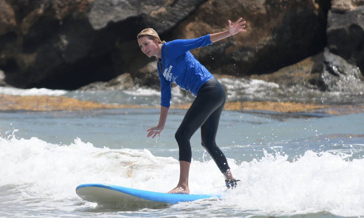 The former first daughter hit the waves with her kids