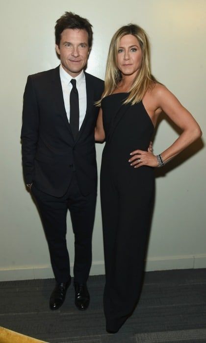 December 5: Jennifer Aniston and Jason Bateman were the perfect co-workers during the <i>Office Christmas Party</i> screening presented by the Cinema Society and Svedka vodka in NYC.
Photo: Jamie McCarthy/Getty Images