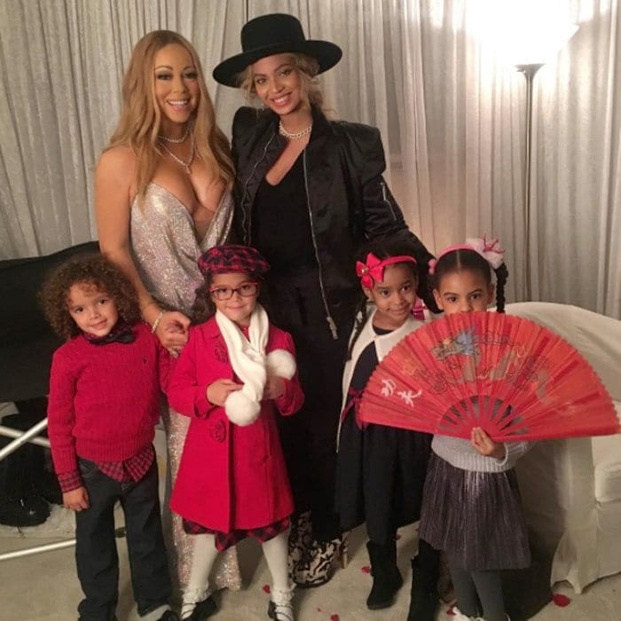 Talk about an A-list playdate! Mariah Carey and Beyonce's kids came together at New York's Beacon Theatre before Mariah's holiday concert for a"family" photo. The All I Want For Christmas Is You singer shared a picture from backstage featuring her twins Moroccan and Monroe Cannon along with Blue Ivy Carter, posing with a fan. Attached to the image, the mom-of-two wrote, "Backstage at Christmas time with our beautiful children. @beyonce #christmas #family #love."
Photo: Instagram/@mariahcarey